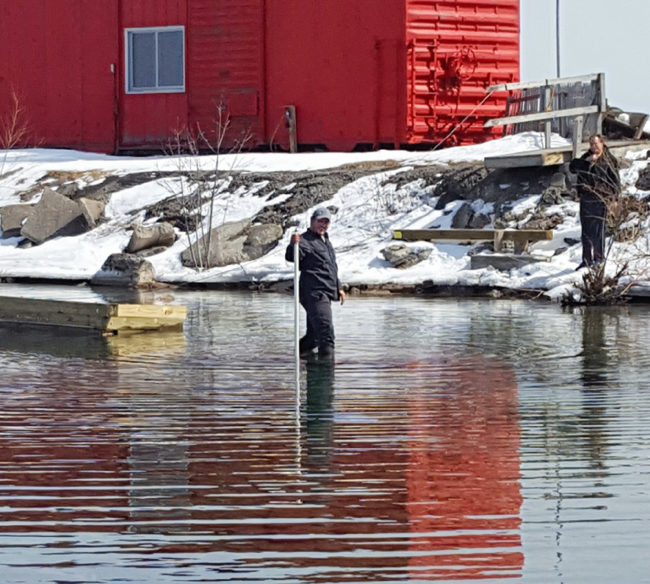 It only looks like we are walking on water, but we really will go to great extents to get the job done!